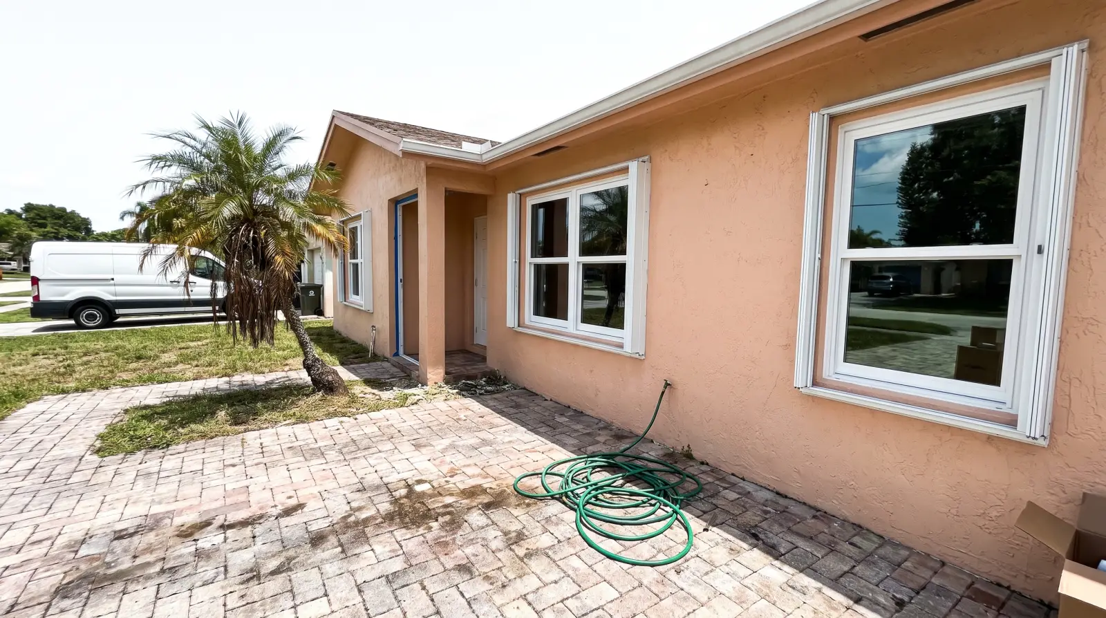 Impact windows on a single-family home in Greenacres, FL