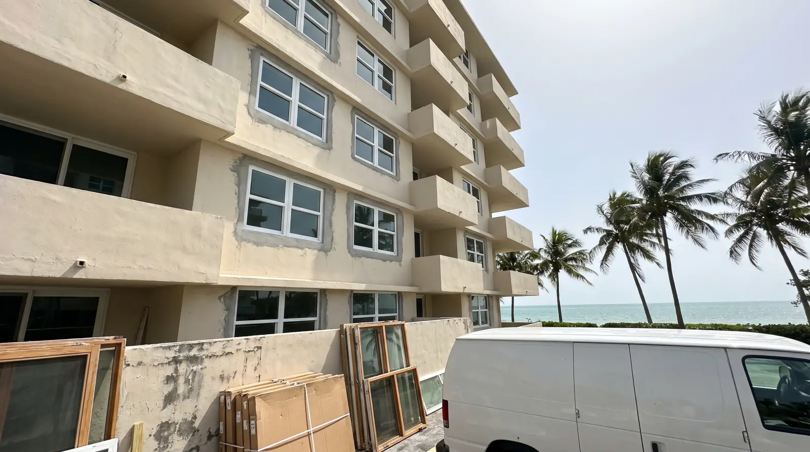 Impact sliding glass doors on an oceanfront condo balcony in Key Biscayne, FL