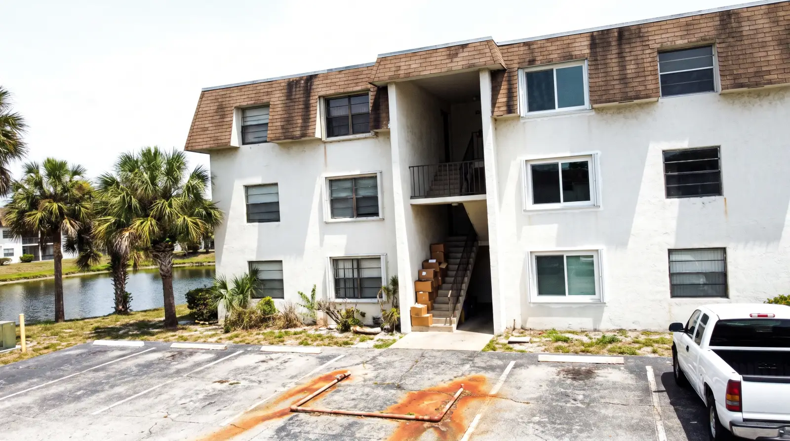 Impact windows on a garden condo building in Lauderdale Lakes, FL