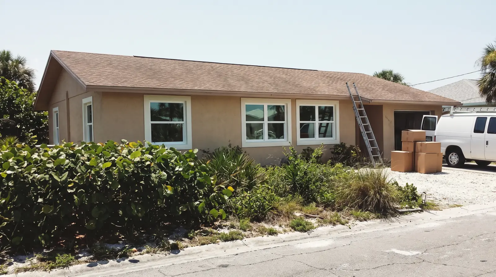 Impact windows on a barrier-island home in Ocean Ridge, FL