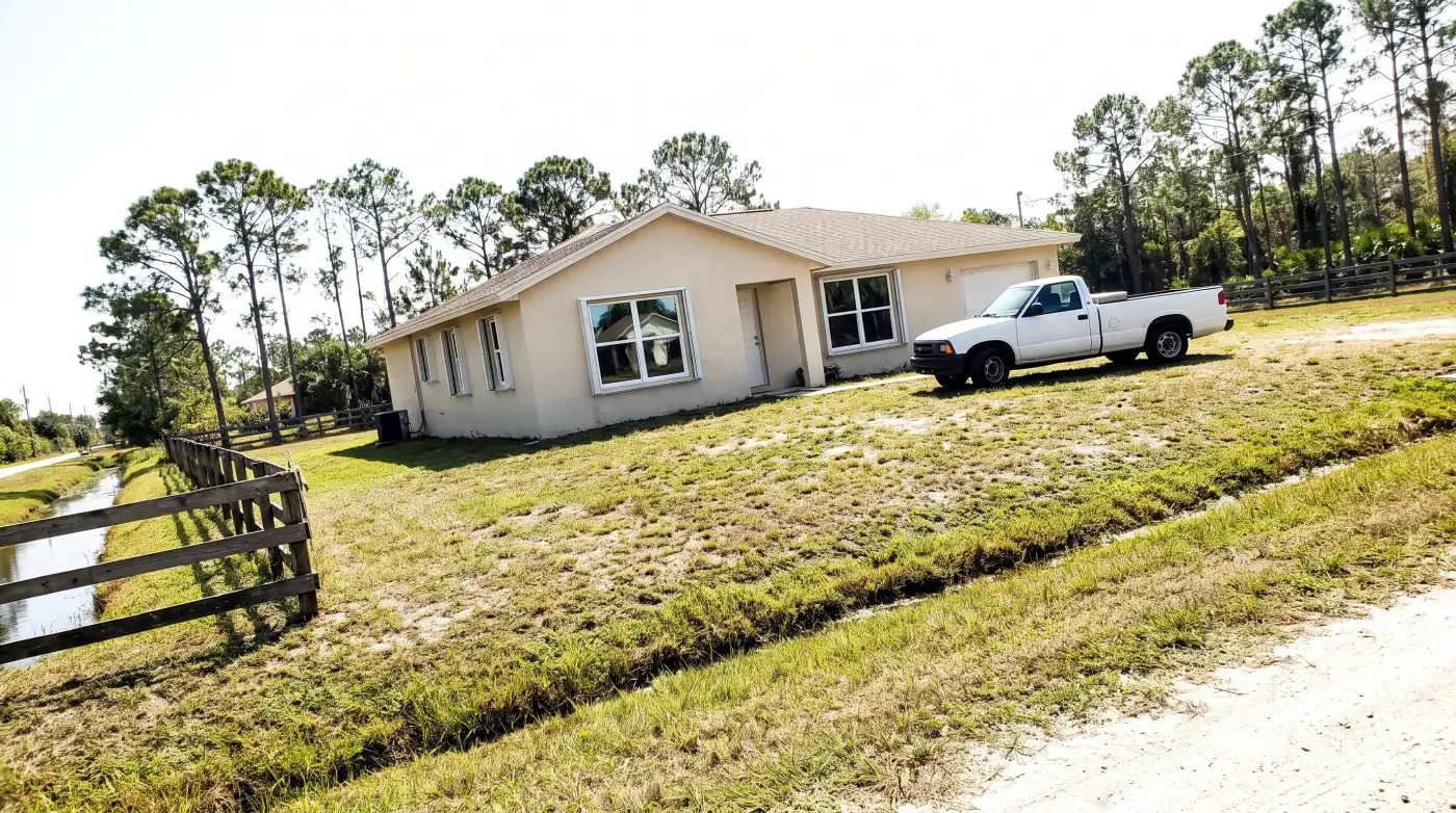 Impact windows on a single-family home on a one-acre lot in The Acreage, FL