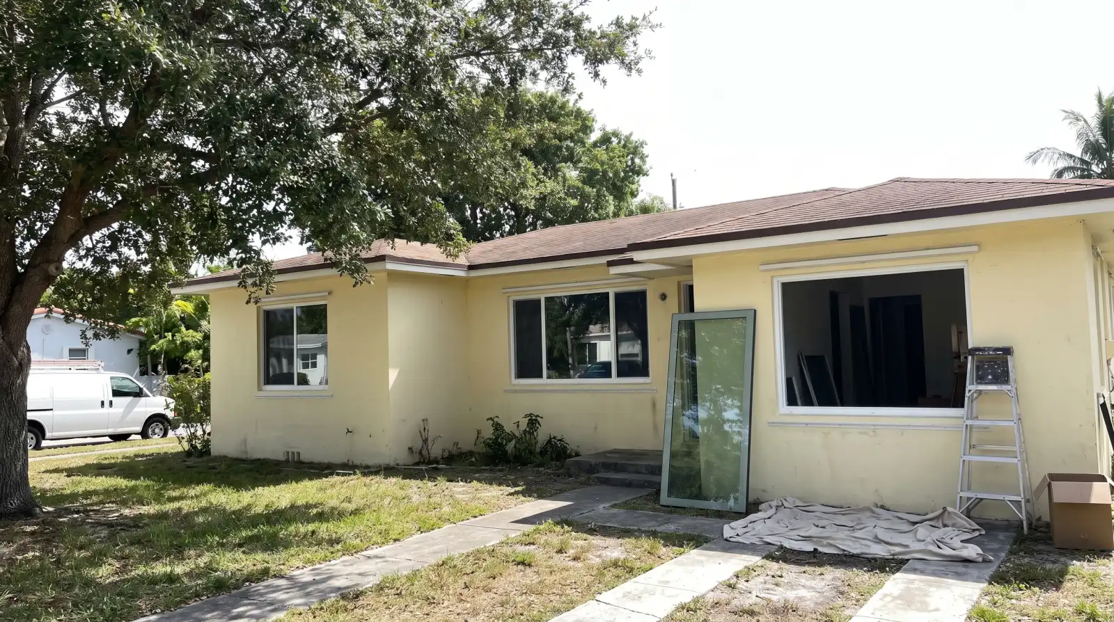 Impact windows being installed on a 1940s home in Biscayne Park, FL