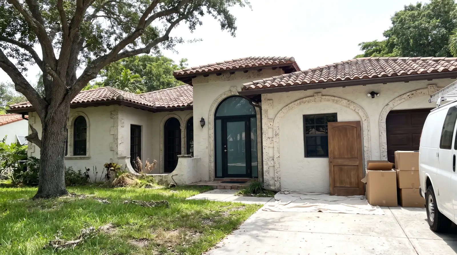 Impact entry door on a Mediterranean Revival home in Coral Gables, FL