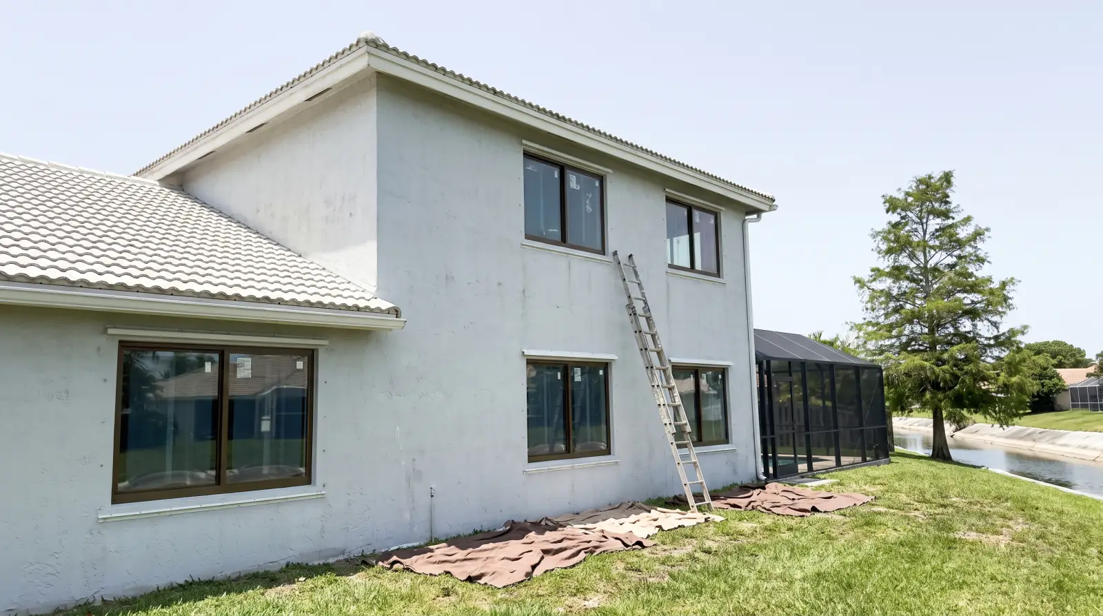 Impact windows being installed on a 1980s home in Coral Springs, FL