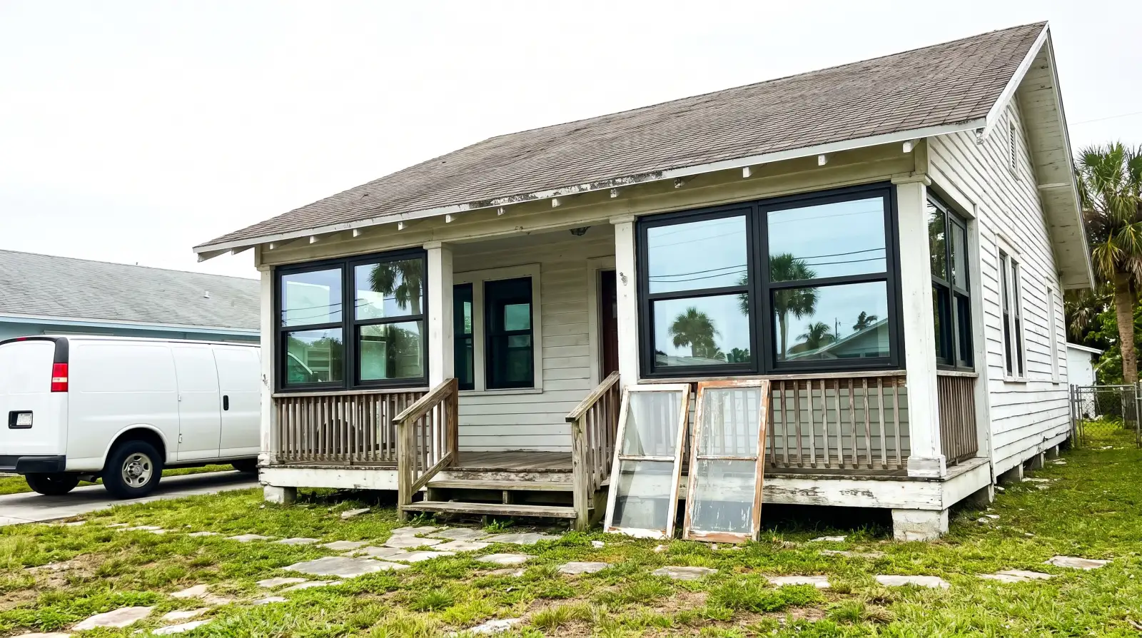 Impact windows on a 1920s frame cottage in Lake Worth Beach, FL