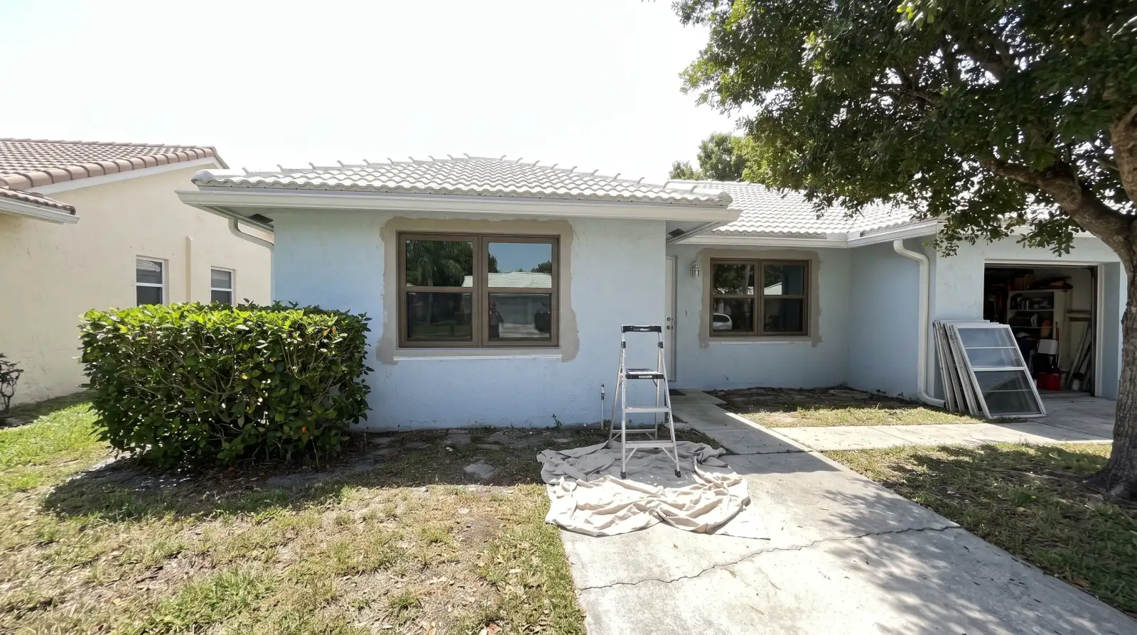 Impact windows being installed on a 1970s home in Margate, FL