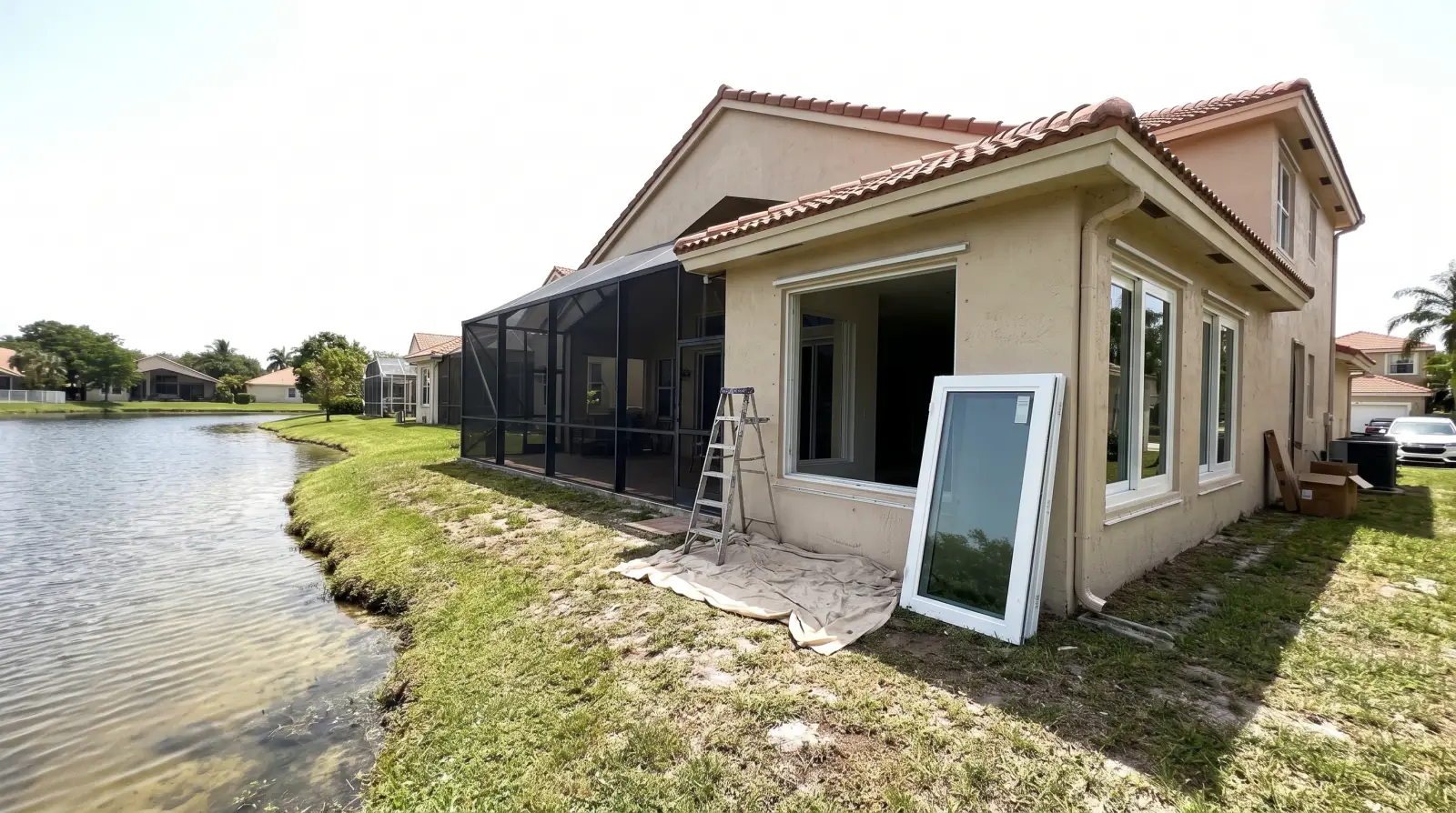 Impact windows on a lakefront home in Miami Lakes, FL