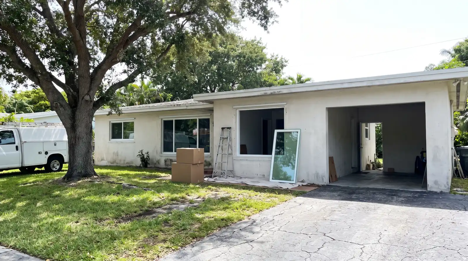 Impact windows being installed on a 1950s home in Miami Shores, FL