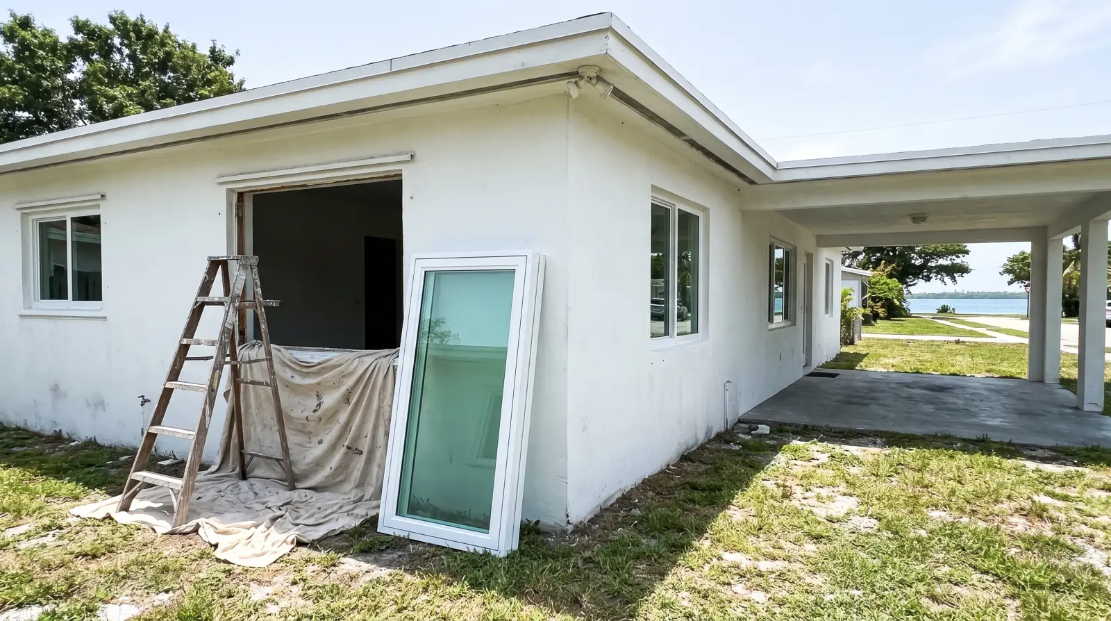 Impact windows on a mid-century home in North Miami, FL