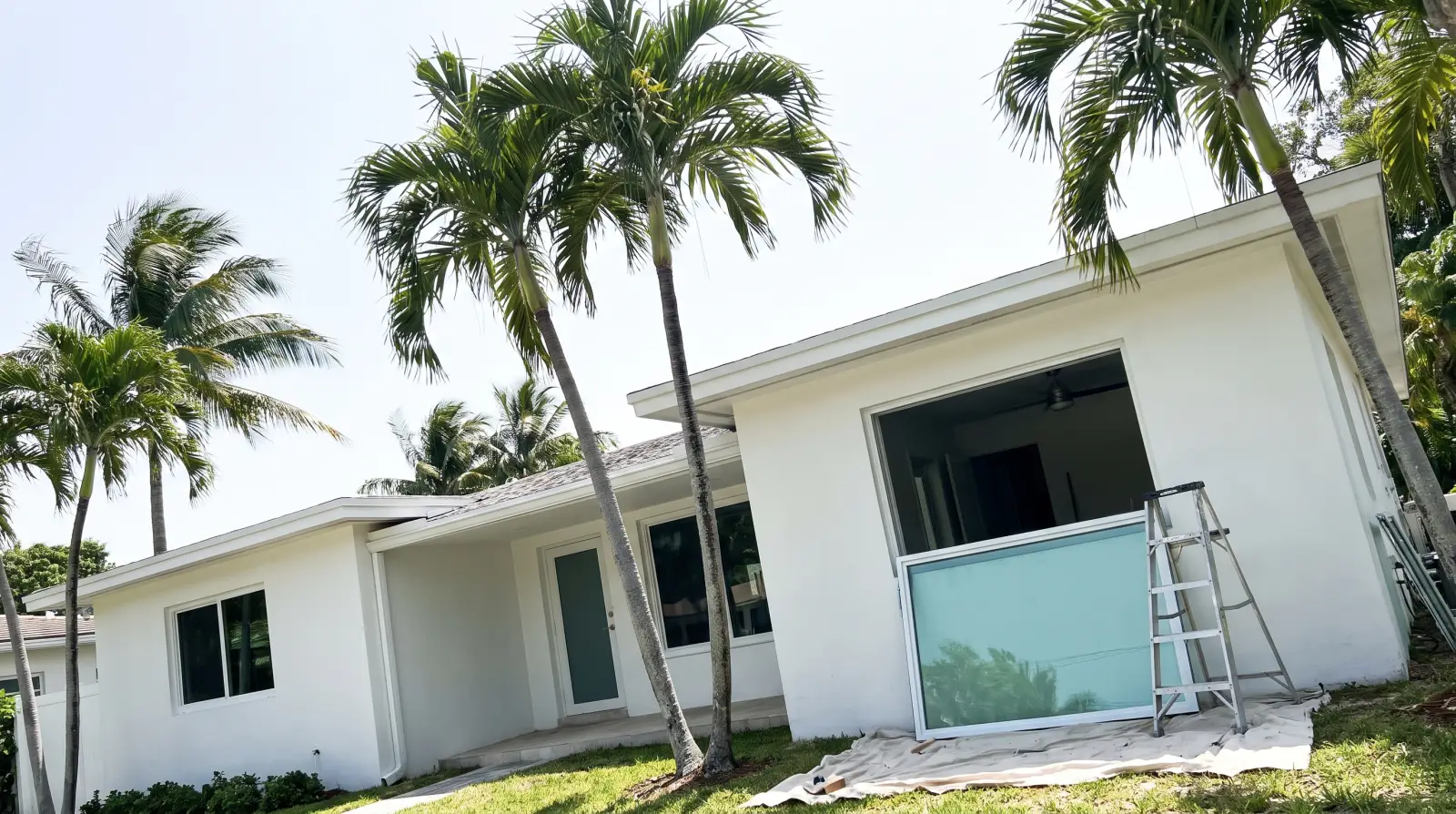 Impact windows on a mid-century home in Surfside, FL